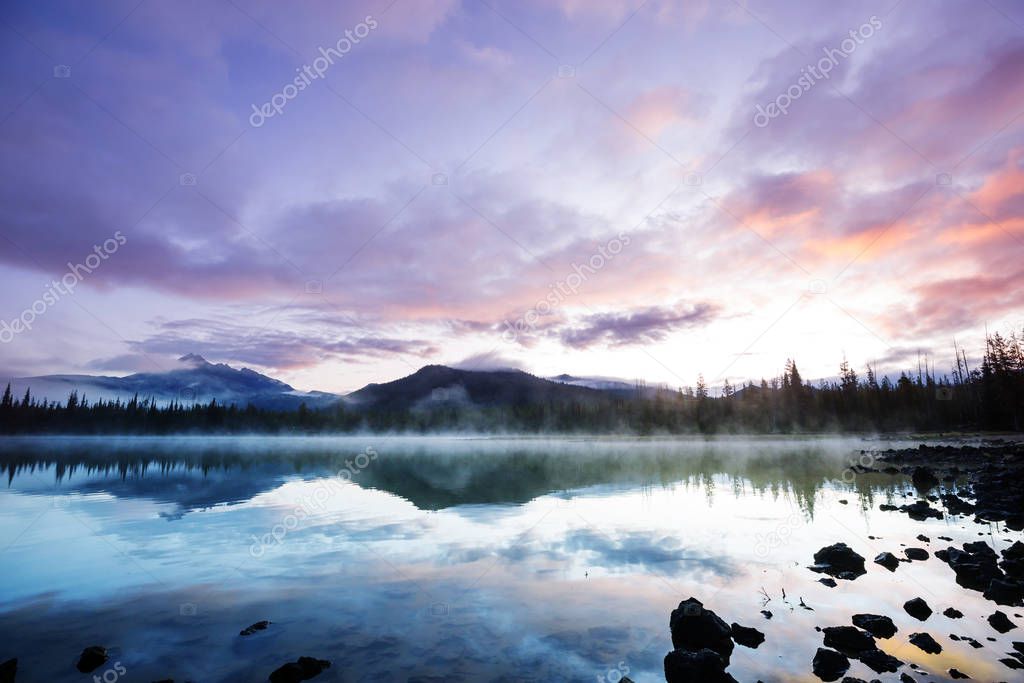 Serene beautiful lake in morning mountains, Oregon, USA.