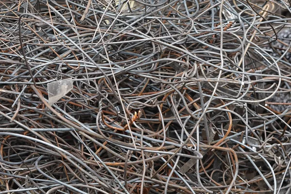 Metal Tangled Wire Texture. Closeup of Lots Metal Wire.