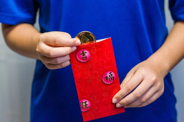 Girl opening Red Packet — Stock Photo, Image