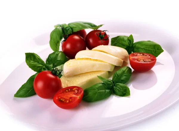 Mozzarella cherry tomatoes basil — Stock Photo, Image