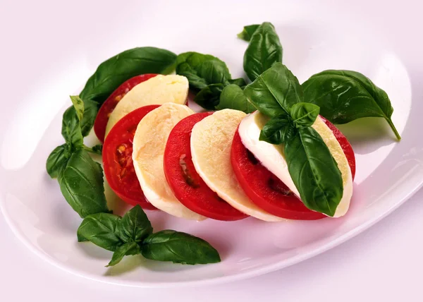 Mozzarella cherry tomatoes basil — Stock Photo, Image