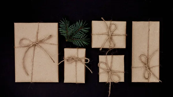 Gift boxes on black — Stock Photo, Image