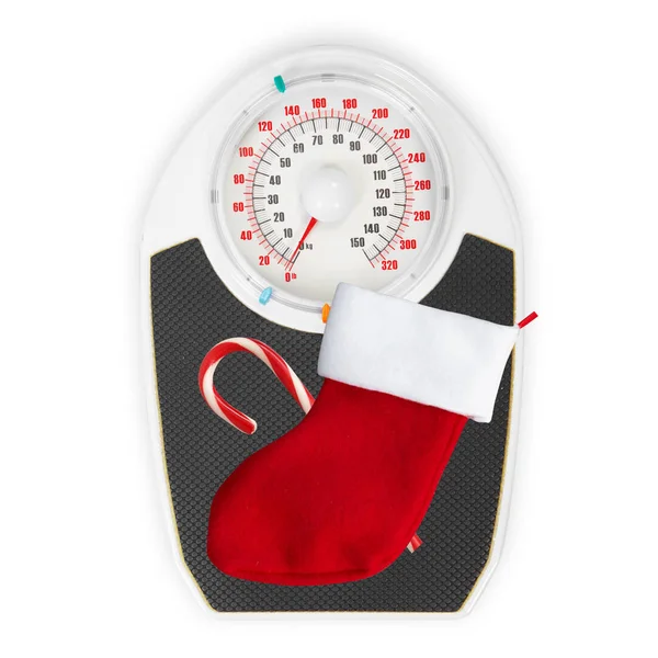 Κόκκινη Χριστουγεννιάτικη κάλτσα και κλίμακες σε λευκό φόντο — Φωτογραφία Αρχείου