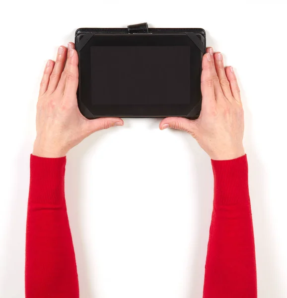 Hände in roter Jacke und Tablet — Stockfoto