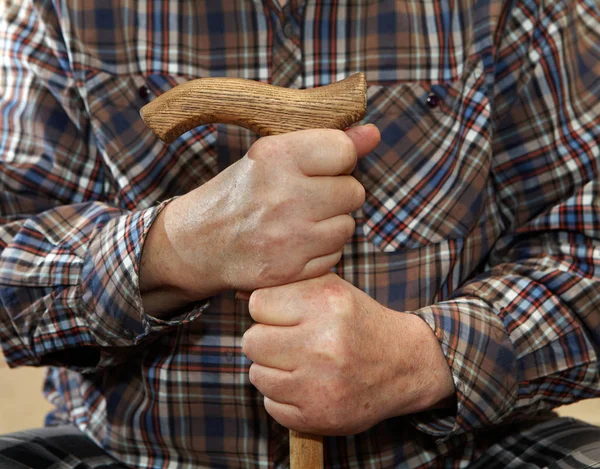 Old man hands with cane — Stock Photo, Image