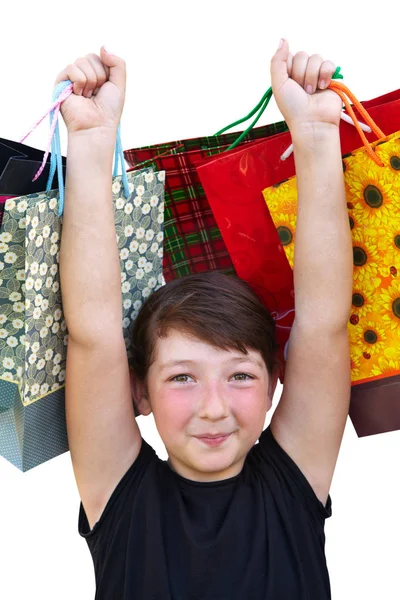 Little girl with shopping bags on white background — Stock Photo, Image