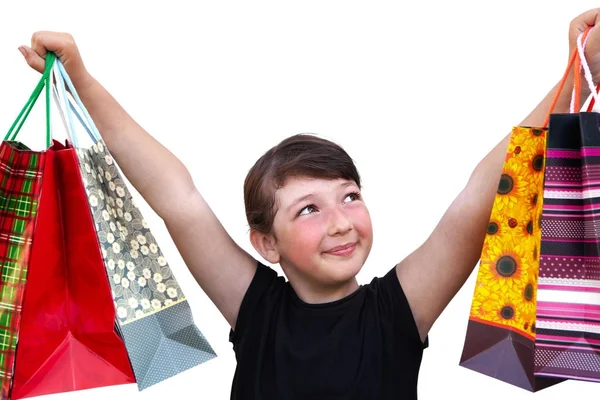 Little girl with shopping bags on white background — Stock Photo, Image