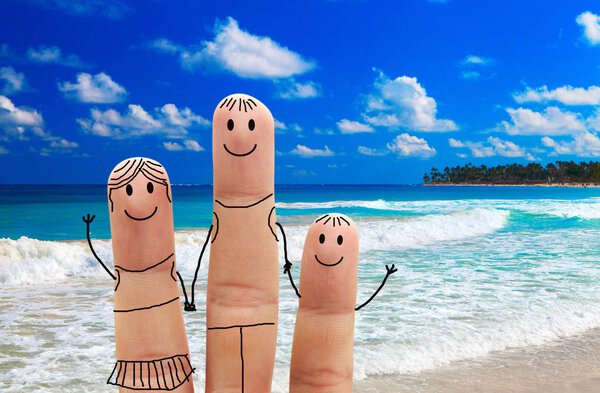 Family on the beach. Exotic vacation