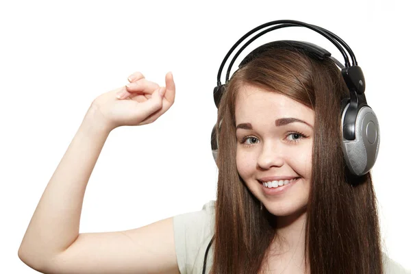 Glad tjej, lyssna på musik — Stockfoto