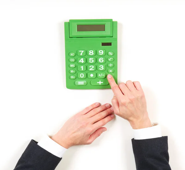 Hände Geschäftsfrau und grüner Taschenrechner — Stockfoto