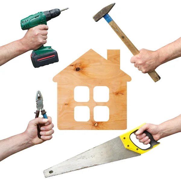 Handen van de werknemers met gereedschap en huis — Stockfoto