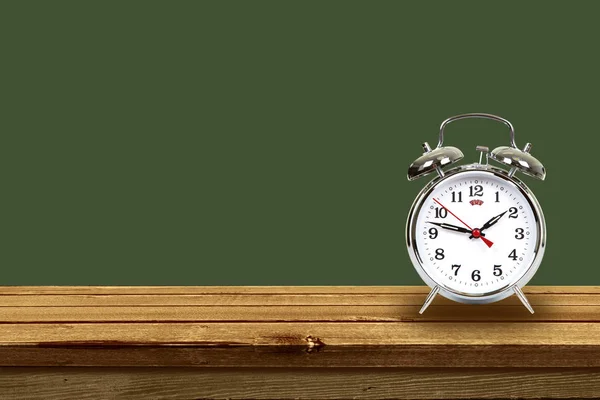 Retro alarm-clock on table — Stock Photo, Image