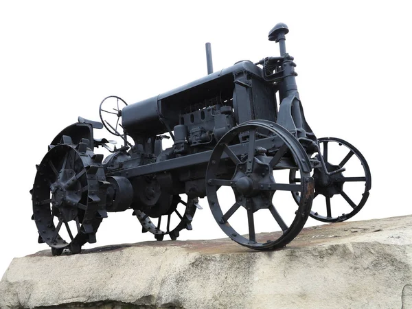 Abstrakter schwarzer alter Traktor isoliert über weißem — Stockfoto