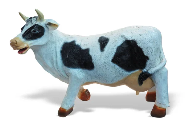 Estatueta de brinquedo de vaca branca e preta isolada — Fotografia de Stock