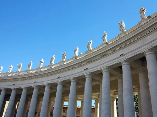 Statues and architectural details on Saint Peter square in Vatic Stock Photo