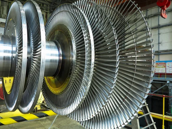 Power generator steam turbine in repair process, machinery, pipes, tubes, at an power plant