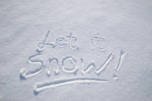 Palabra "nieve" escrita en la nieve — Foto de Stock