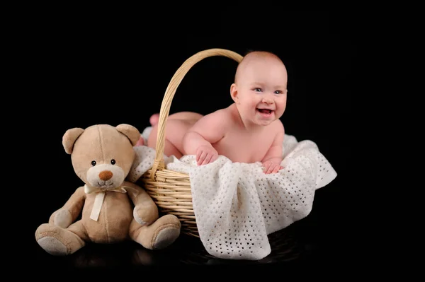 One month old baby boy in the basket — Stock Photo, Image