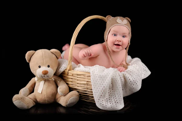 One month old baby boy in the basket — Stock Photo, Image