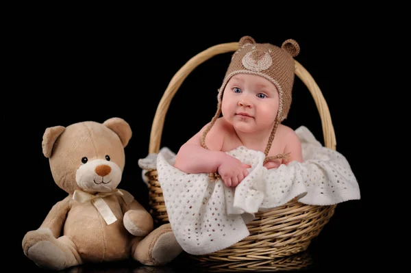 One month old baby boy in the basket — Stock Photo, Image