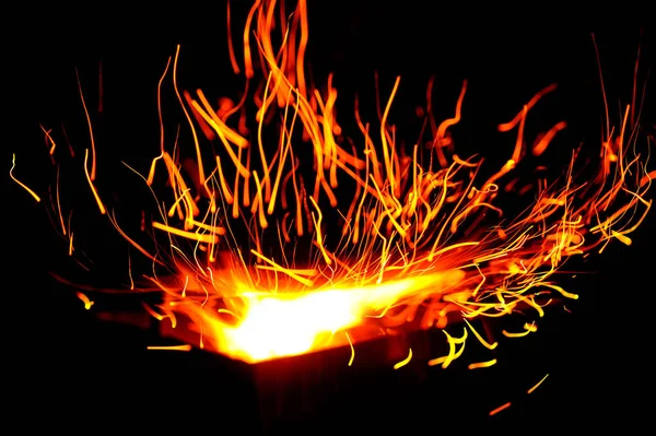 Glowing Flow of Sparks in the Dark — Stock Photo, Image