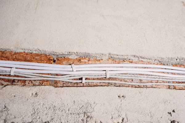 Electrical renovation work on old house installing new power lin