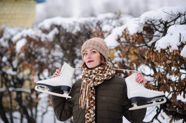 ice skating outdoors on a pond, winter sport