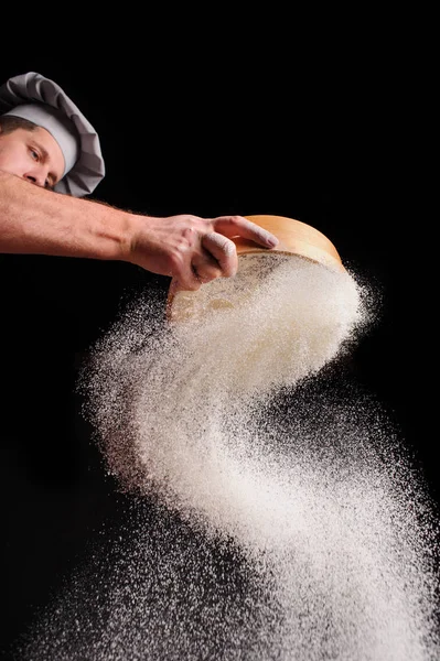 Chef Sifts Flour Black Background — Stock Photo, Image