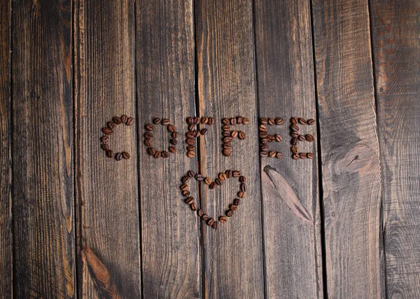 Word Kahve Kahve Çekirdekleri Ahşap Arka Plan Üzerinde Yapılan — Stok fotoğraf