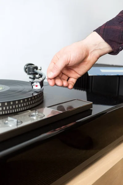 Man hand Carefully putting needle — Stock Photo, Image