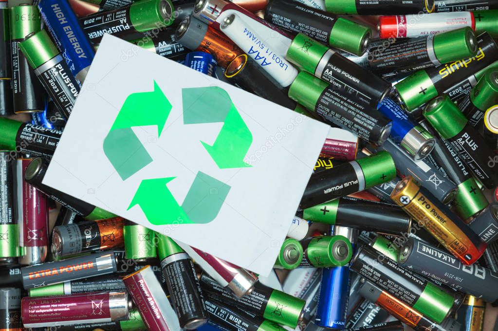 Batteries and green recycle symbol