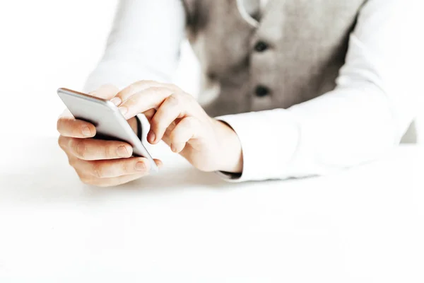 Close up image of businessman using a smartphone — Stock Photo, Image