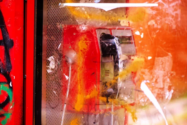 Demolished and vandalized public phone booth on street — Φωτογραφία Αρχείου