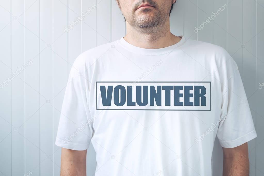 Guy wearing shirt with Volunteer label printed on chest