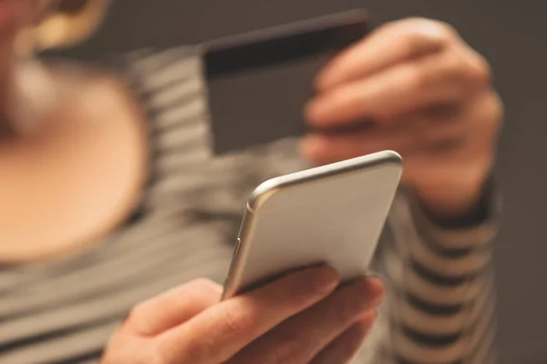 Woman using smartphone app to check e-wallet account balance — Stock Photo, Image