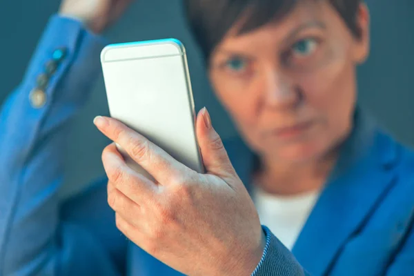 Businesswoman making selfie photo portrait with mobile phone — Stock Photo, Image