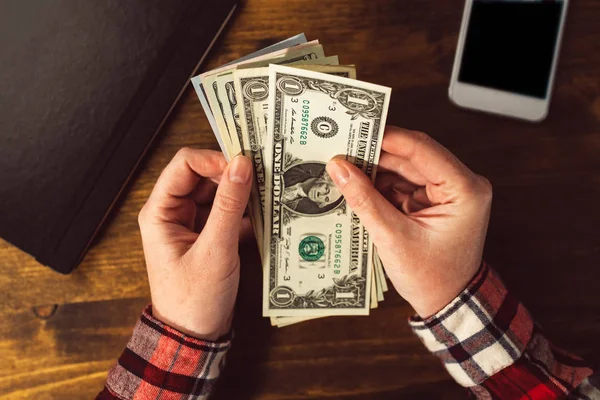 Female hands with US dollar currency cash money — Stock Photo, Image