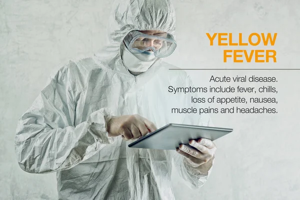 Scientist using tablet to get informed about yellow fever diseas — Stock Photo, Image