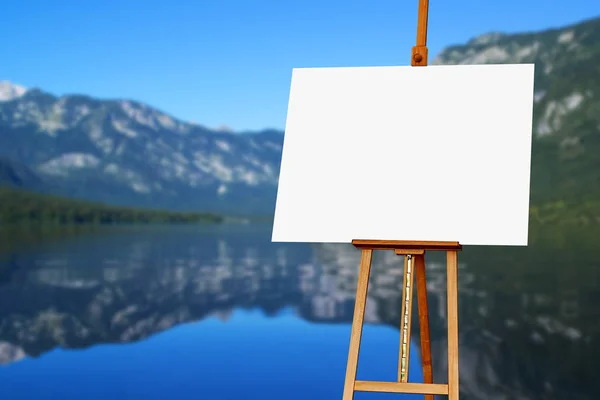Lienzo artista pintor en blanco sobre caballete con lago en el fondo —  Fotos de Stock