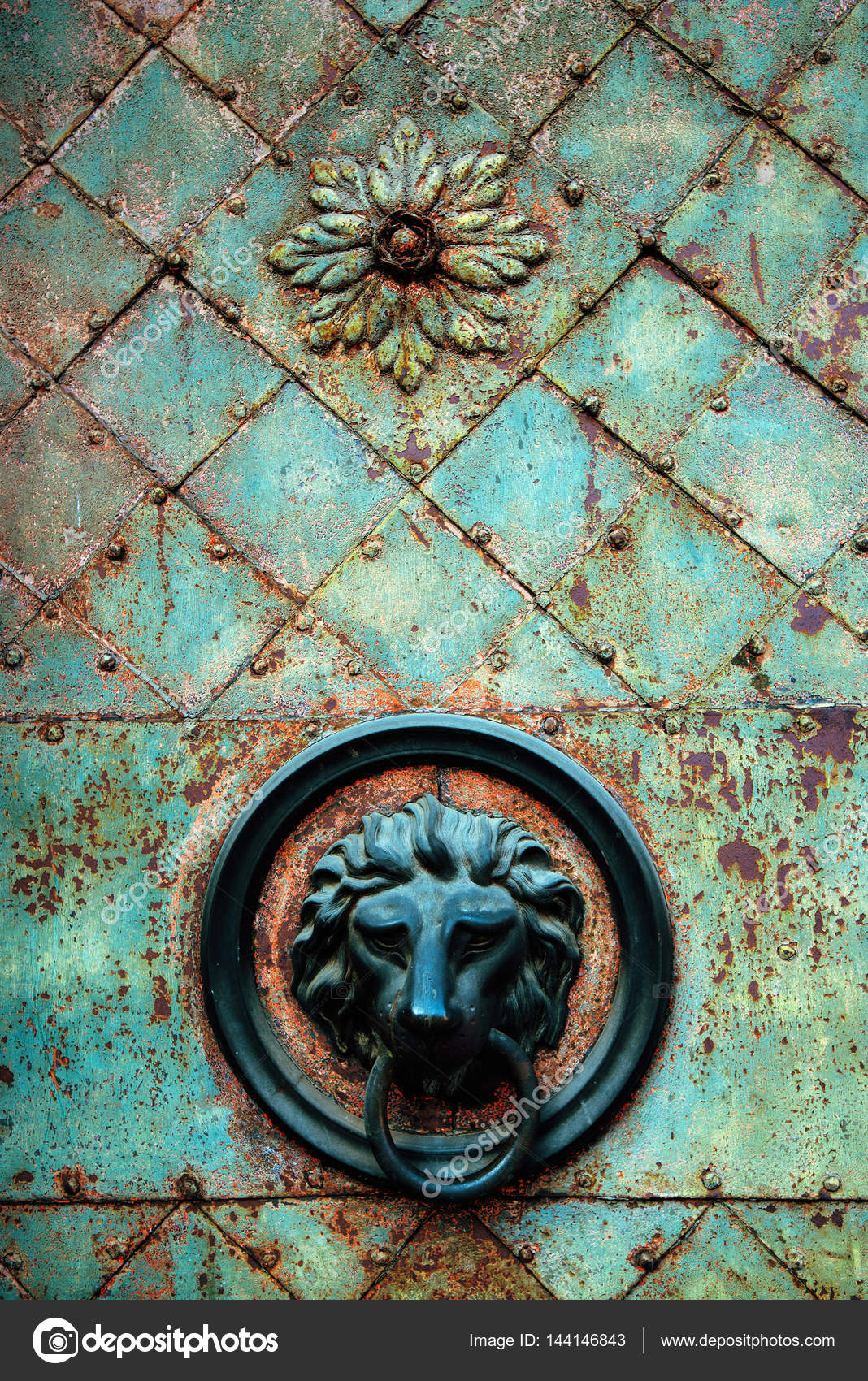 Decorative Gilded Lion Head Door Knob And Knocker Stock Photo