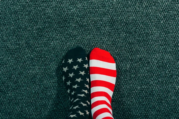 Patriotic adult male wearing USA flag socks — Stock Photo, Image