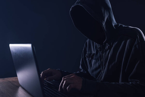 Hacker bypassing hardware firewall on laptop computer