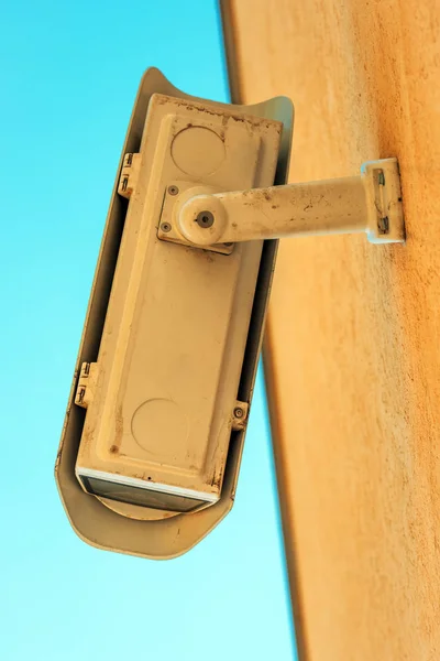 Low angle view of security camera housing — Stock Photo, Image