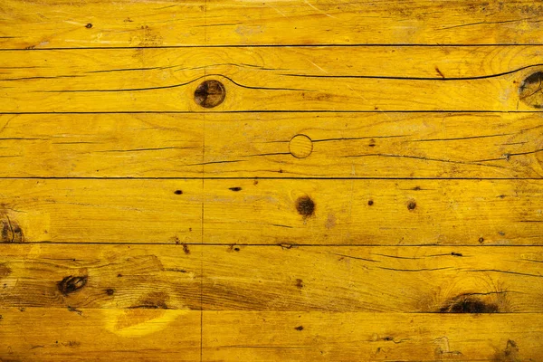 Sfondo e consistenza di tavole di legno di ywllow stagionato — Foto Stock
