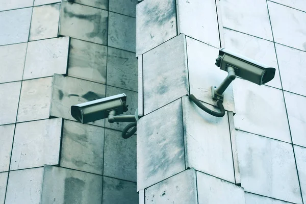 Big brother concept with two security cameras — Stock Photo, Image