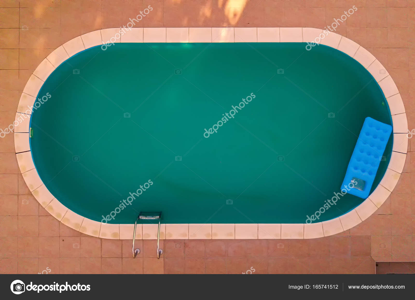 aerial view of inflatable mattress in swimming pool summer fun and enjoyment leisure activity equipment in the poolside water from drone point of view - Rectangle Pool Aerial View aerial view of inflatable mattress in swimming pool summer fun and enjoyment leisure activity equipment in the poolside water from drone point of view - Rectangle Pool Aerial View