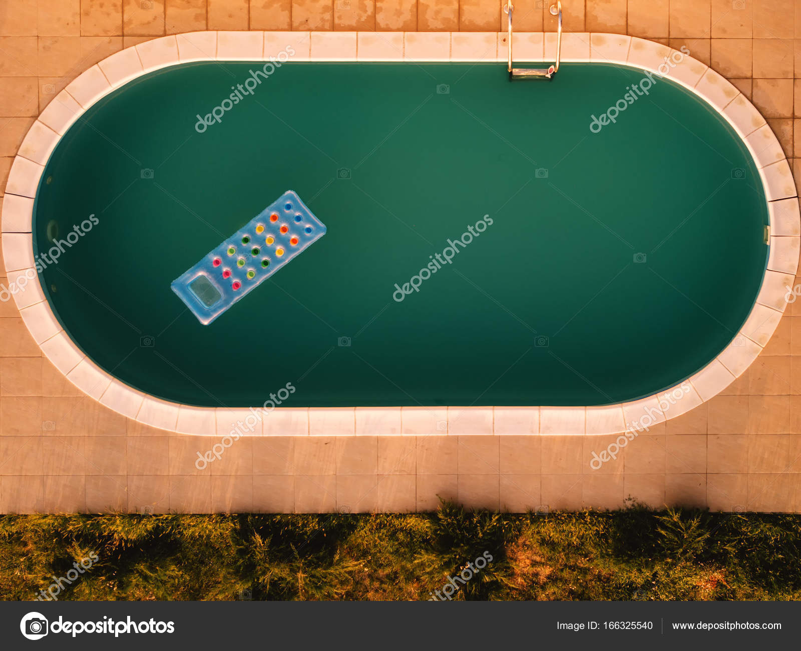aerial view of inflatable mattress in swimming pool summer fun and enjoyment leisure activity equipment in the poolside water from drone point of view - Rectangle Pool Aerial View aerial view of inflatable mattress in swimming pool summer fun and enjoyment leisure activity equipment in the poolside water from drone point of view - Rectangle Pool Aerial View