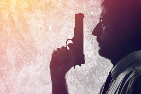 Man with a gun — Stock Photo, Image