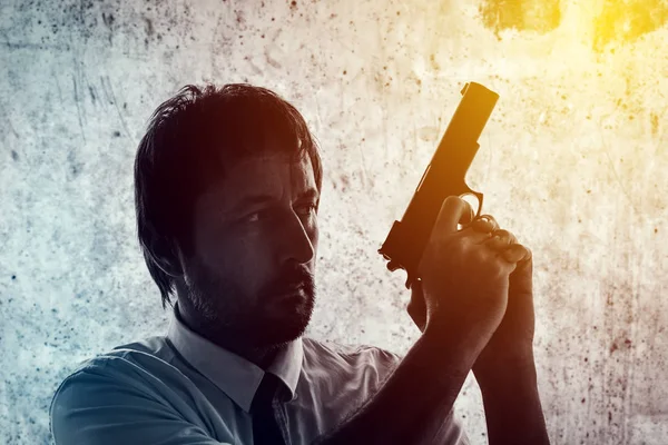 Man with a gun — Stock Photo, Image