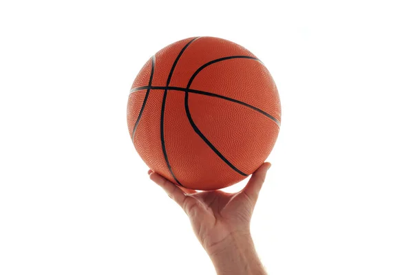 Male hand with basketball ball isolated on white background Royalty Free Stock Images